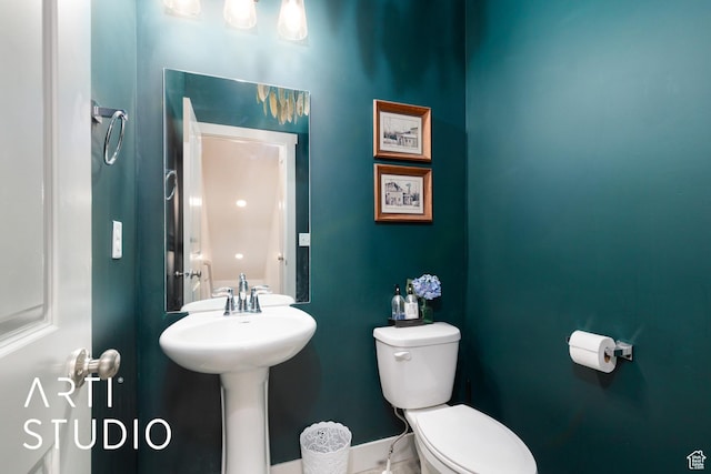 442 E Depot St Unit 107, Clearfield, UT 84015 - bathroom featuring baseboards and toilet