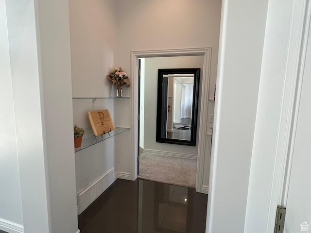 1307 E Brandy Ln S, Tooele, UT 84074 - hall featuring baseboards and dark tile patterned flooring