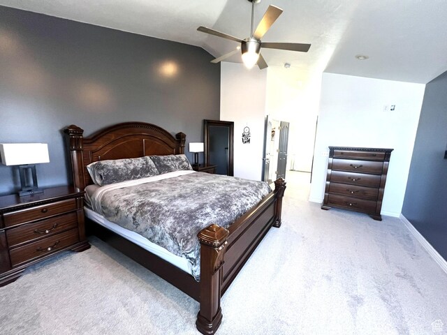 1307 E Brandy Ln S, Tooele, UT 84074 - bedroom featuring a ceiling fan, baseboards, vaulted ceiling, and light carpet