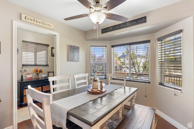5036 W Cedar Point Peak Dr, Riverton, UT 84096 - dining area featuring dark wood-style flooring, ceiling fan, and baseboards