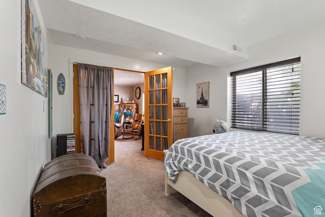5036 W Cedar Point Peak Dr, Riverton, UT 84096 - bedroom featuring visible vents, french doors, and carpet flooring