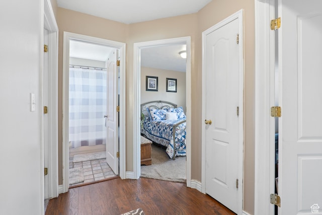 5036 W Cedar Point Peak Dr, Riverton, UT 84096 - corridor with baseboards and dark wood-style flooring