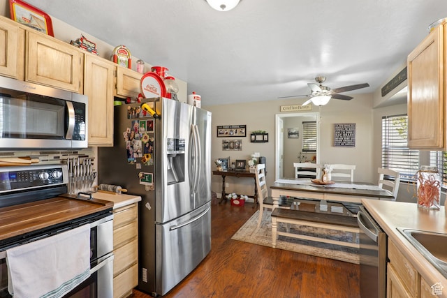 5036 W Cedar Point Peak Dr, Riverton, UT 84096 - kitchen featuring a ceiling fan, light brown cabinets, appliances with stainless steel finishes, and dark wood-type flooring