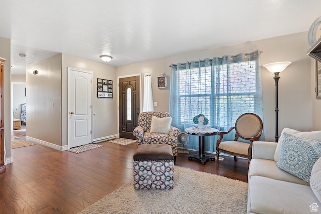 5036 W Cedar Point Peak Dr, Riverton, UT 84096 - living room featuring baseboards and dark wood-type flooring