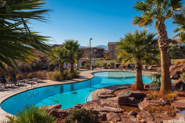 3800 N Paradise Village Dr Unit 1, Santa Clara, UT 84765 - community pool featuring a patio and fence