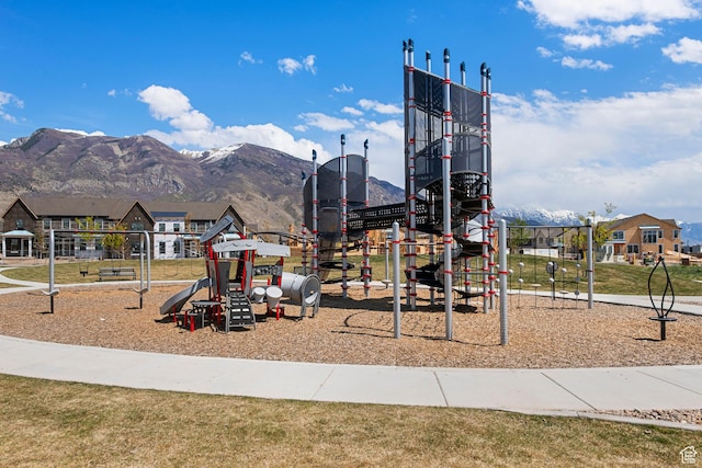 community jungle gym featuring a mountain view