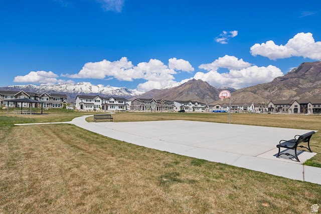 property view of mountains featuring a residential view