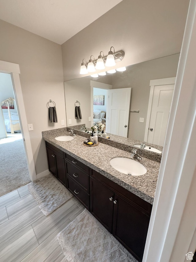 2743 W Lacewood Dr S, Taylorsville, UT 84129 - ensuite bathroom with double vanity, connected bathroom, and a sink