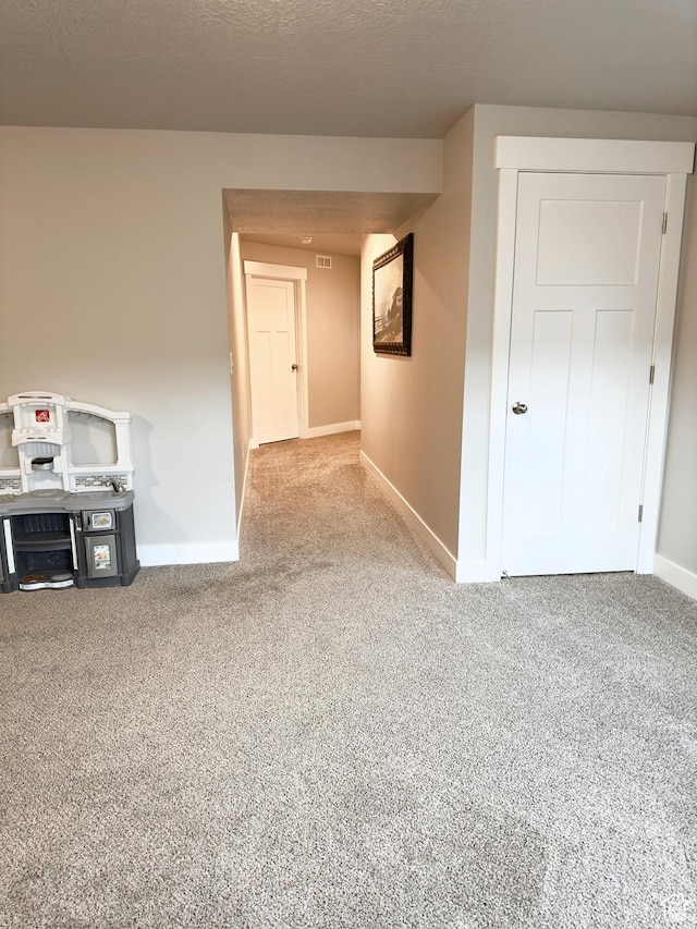 2743 W Lacewood Dr S, Taylorsville, UT 84129 - carpeted empty room with baseboards and visible vents