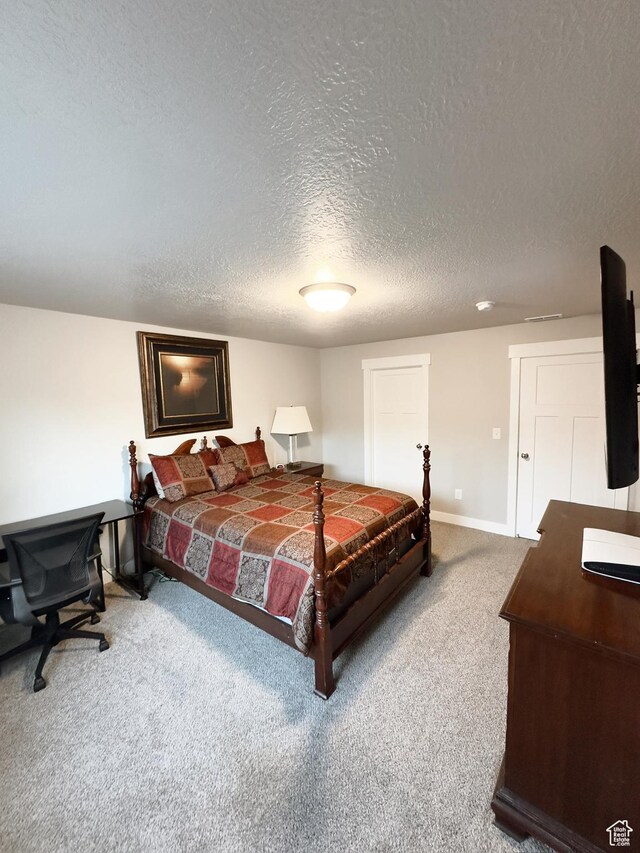 2743 W Lacewood Dr S, Taylorsville, UT 84129 - bedroom with a textured ceiling, baseboards, and carpet floors