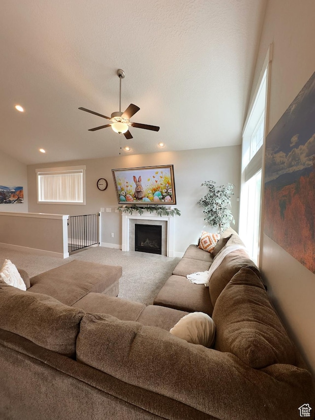 2743 W Lacewood Dr S, Taylorsville, UT 84129 - carpeted living room featuring a fireplace, a ceiling fan, recessed lighting, and baseboards