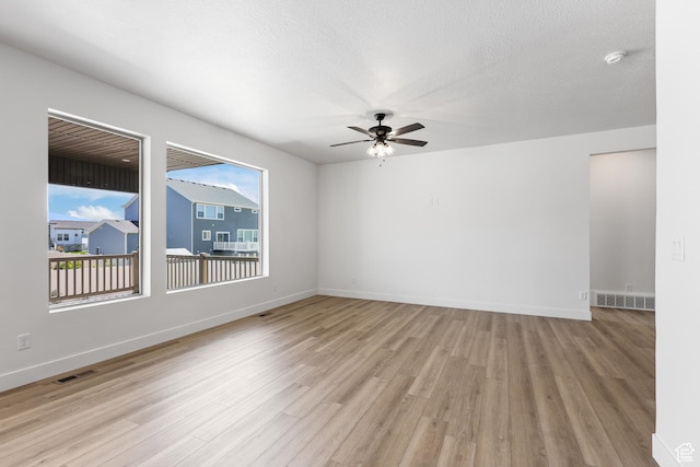 1107 S 4475 W, West Point, UT 84015 - unfurnished room with ceiling fan, light wood finished floors, and a smoke detector