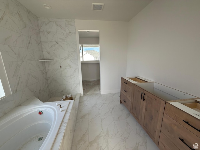 1107 S 4475 W, West Point, UT 84015 - bathroom with marble look tile flooring, a bath, vanity, and a tile shower