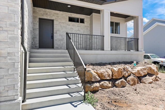 1107 S 4475 W, West Point, UT 84015 - property entrance with covered porch and stone siding