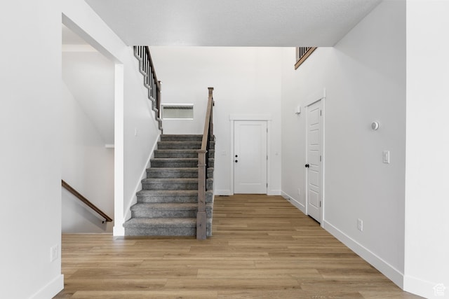 1107 S 4475 W, West Point, UT 84015 - stairs featuring wood finished floors and baseboards