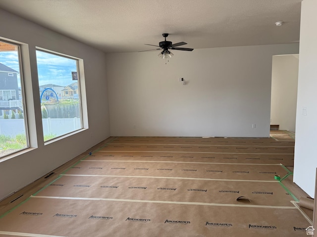 1107 S 4475 W, West Point, UT 84015 - empty room featuring a ceiling fan and a smoke detector