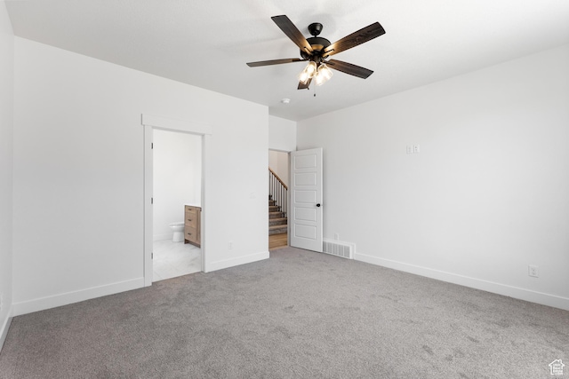 1107 S 4475 W, West Point, UT 84015 - unfurnished bedroom featuring light colored carpet, ensuite bath, and a ceiling fan