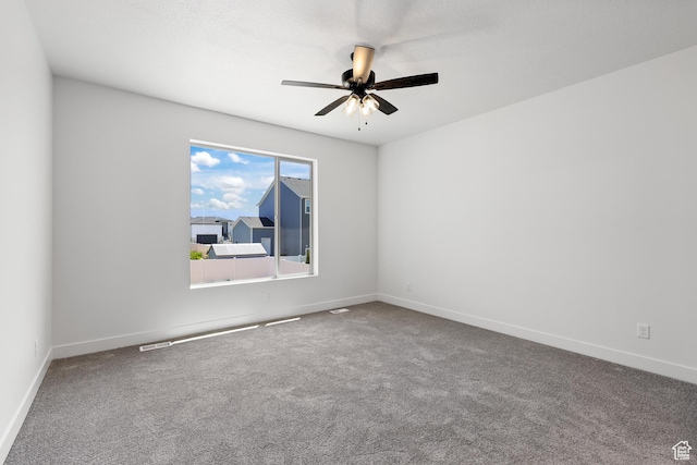 1107 S 4475 W, West Point, UT 84015 - spare room featuring a ceiling fan and carpet