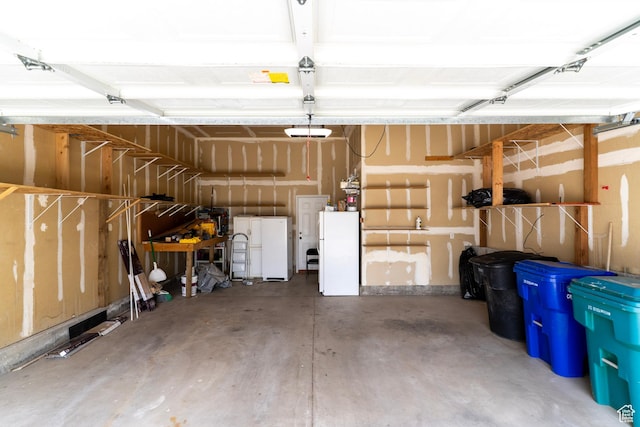 1608 W 8470 S, West Jordan, UT 84088 - garage with a garage door opener and freestanding refrigerator