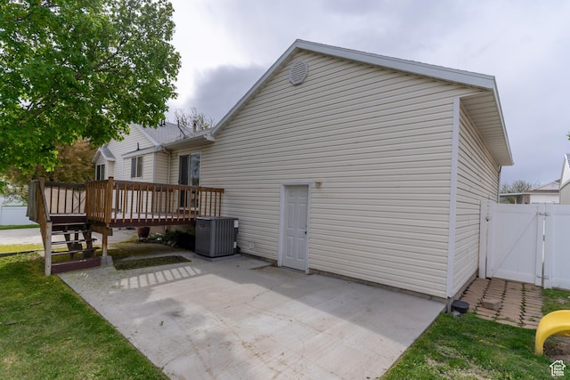 1608 W 8470 S, West Jordan, UT 84088 - rear view of property with a gate, a wooden deck, cooling unit, and a patio area