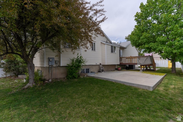 1608 W 8470 S, West Jordan, UT 84088 - back of house with a yard, a patio area, and a wooden deck