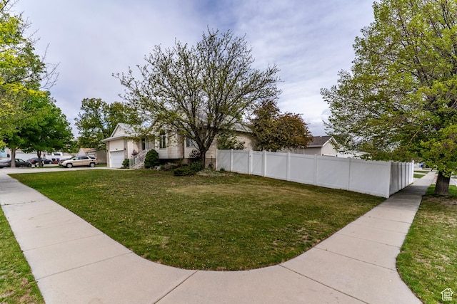 1608 W 8470 S, West Jordan, UT 84088 - view of yard featuring fence and an attached garage