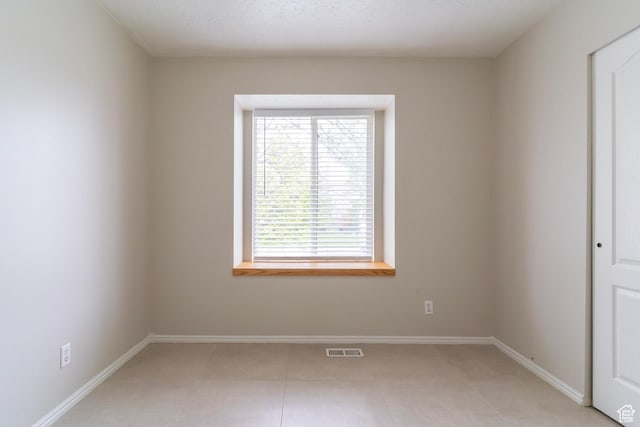 1608 W 8470 S, West Jordan, UT 84088 - unfurnished room featuring baseboards, visible vents, and light tile patterned floors
