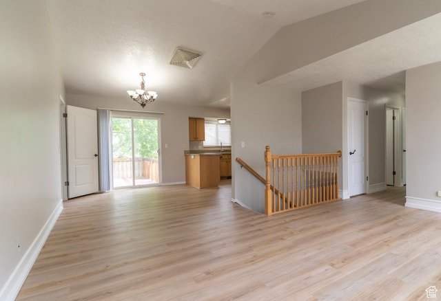 1608 W 8470 S, West Jordan, UT 84088 - spare room featuring visible vents, an inviting chandelier, baseboards, and light wood-style floors
