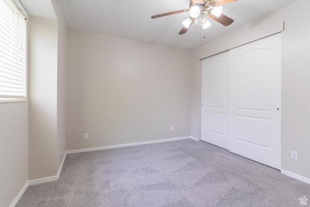 1608 W 8470 S, West Jordan, UT 84088 - unfurnished bedroom with ceiling fan, a closet, baseboards, and carpet floors