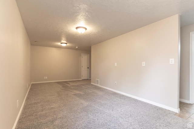 1608 W 8470 S, West Jordan, UT 84088 - unfurnished room with a textured ceiling, visible vents, light colored carpet, and baseboards