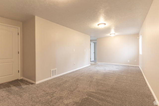 1608 W 8470 S, West Jordan, UT 84088 - carpeted empty room featuring a textured ceiling, visible vents, and baseboards