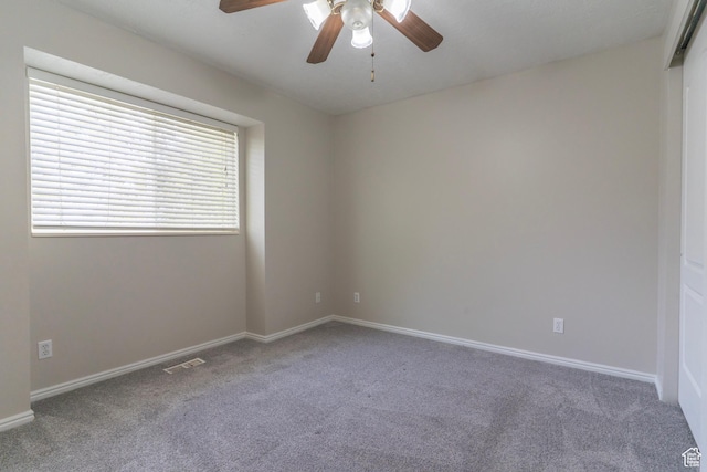 1608 W 8470 S, West Jordan, UT 84088 - carpeted spare room with baseboards, visible vents, and a ceiling fan