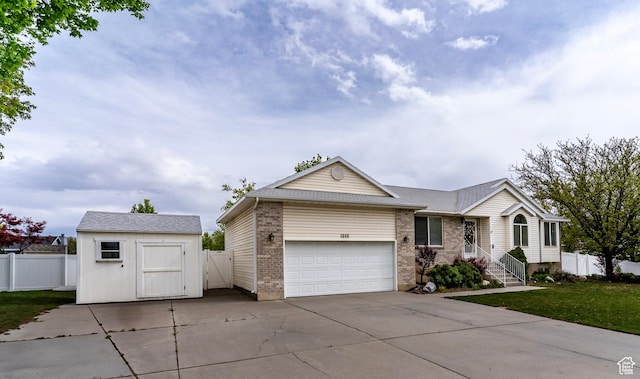 1608 W 8470 S, West Jordan, UT 84088 - ranch-style house featuring fence, concrete driveway, brick siding, and an attached garage