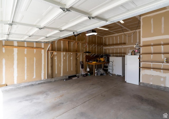 1608 W 8470 S, West Jordan, UT 84088 - garage with a garage door opener and freestanding refrigerator