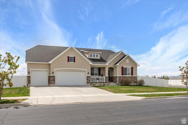 3339 W 650 N, Layton, UT 84041 - craftsman house with a front yard, covered porch, stone siding, stucco siding, and fence