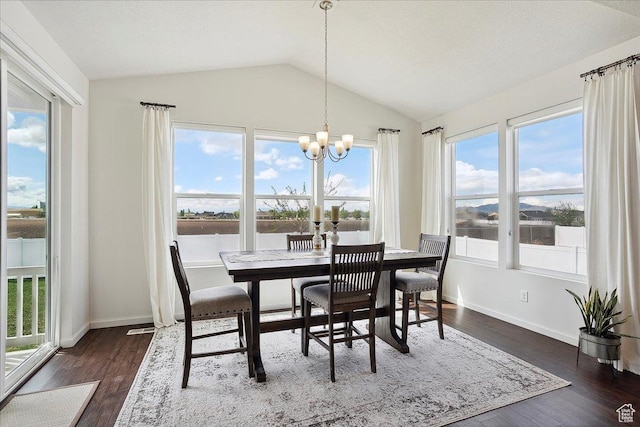 3339 W 650 N, Layton, UT 84041 - dining area with dark wood-style floors, baseboards, an inviting chandelier, and vaulted ceiling