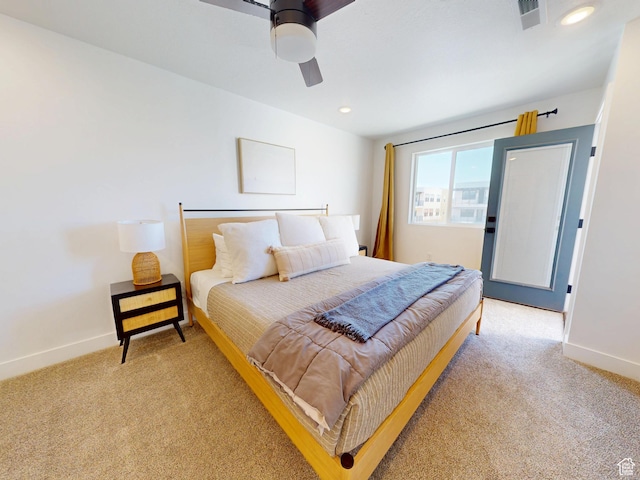 5399 S Cerulean Ln Unit 98, St George, UT 84790 - bedroom with baseboards, visible vents, light carpet, and ceiling fan