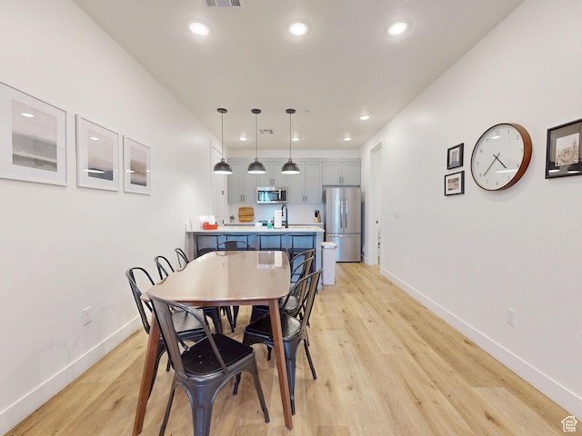 5399 S Cerulean Ln Unit 98, St George, UT 84790 - dining room with baseboards, recessed lighting, visible vents, and light wood-style flooring