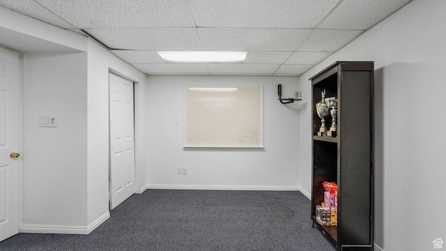 450 E Waterford Way, Midvale, UT 84047 - interior space featuring baseboards, dark carpet, and a paneled ceiling