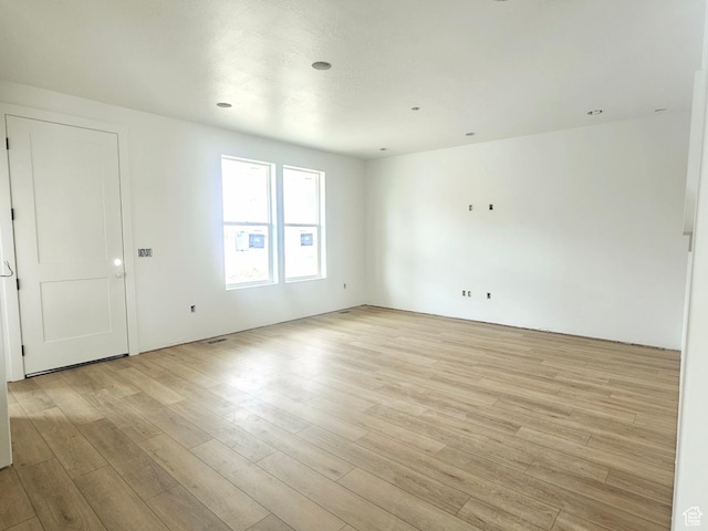 2814 W 2705 N Unit 89, Plain City, UT 84404 - empty room featuring light wood finished floors