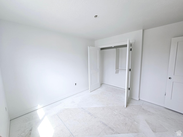 2814 W 2705 N Unit 89, Plain City, UT 84404 - unfurnished bedroom with baseboards and a closet
