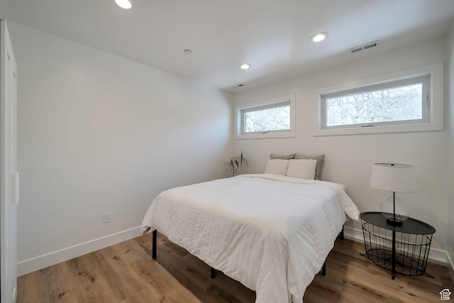 4460 Fawn Way Unit 2039, Heber City, UT 84032 - bedroom with visible vents, recessed lighting, baseboards, and light wood-type flooring