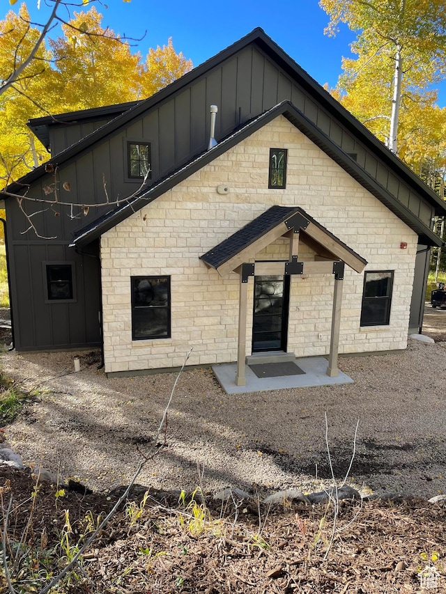 4460 Fawn Way Unit 2039, Heber City, UT 84032 - rear view of house featuring board and batten siding and stone siding