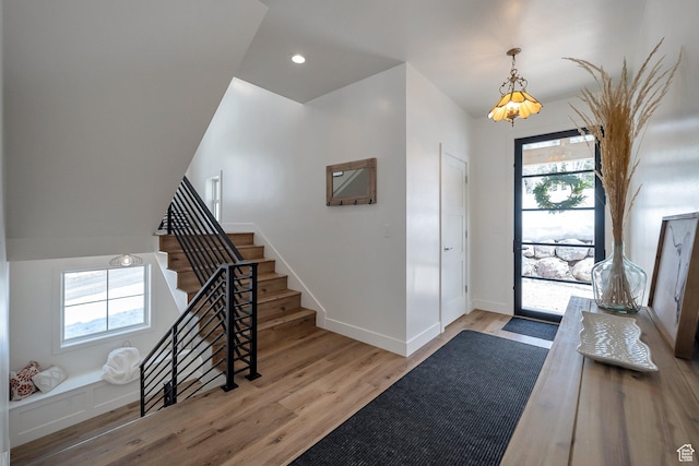 4460 Fawn Way Unit 2039, Heber City, UT 84032 - entrance foyer featuring a notable chandelier, stairs, recessed lighting, baseboards, and wood finished floors