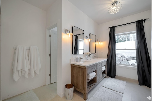 4460 Fawn Way Unit 2039, Heber City, UT 84032 - full bath with double vanity, a sink, and an inviting chandelier