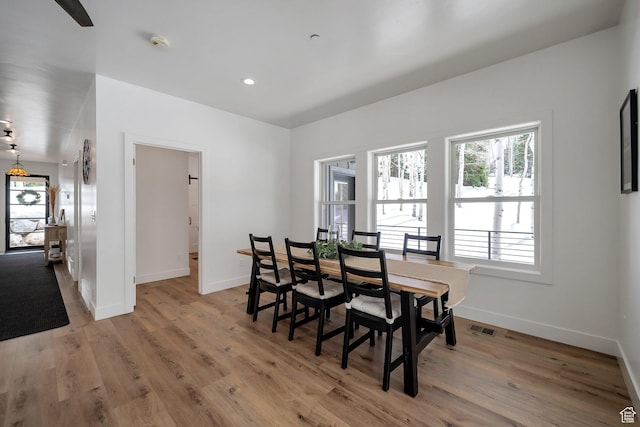 4460 Fawn Way Unit 2039, Heber City, UT 84032 - dining area with visible vents, plenty of natural light, and light wood-style flooring