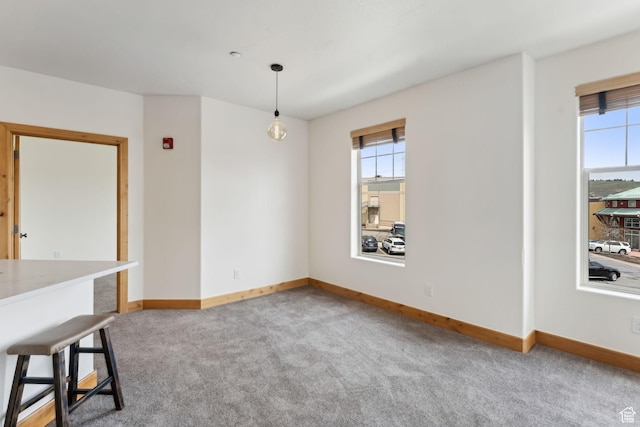 1541 Redstone Ave Unit C, Park City, UT 84098 - unfurnished dining area with baseboards, carpet, and a wealth of natural light