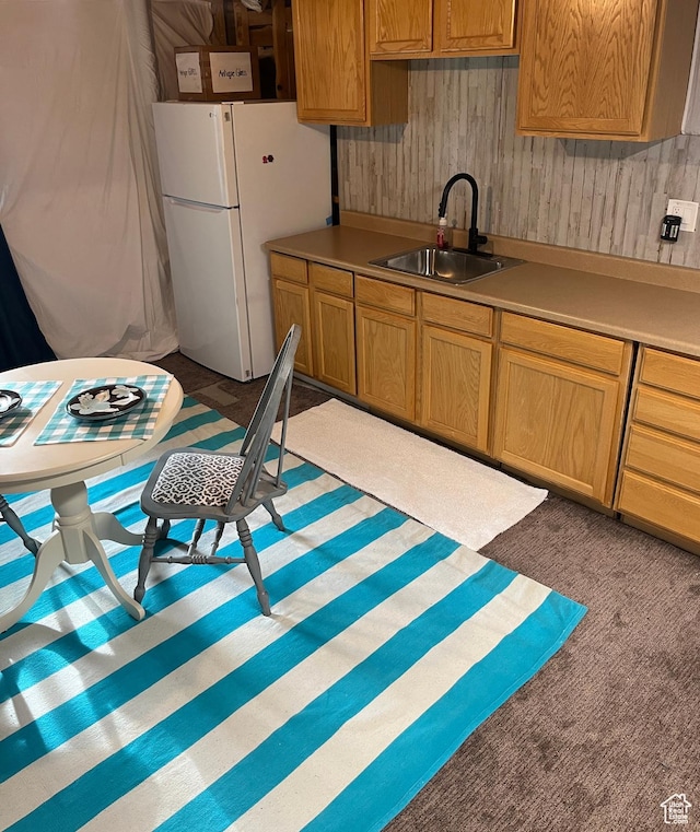 864 E 180 N, Salem, UT 84653 - kitchen featuring carpet flooring, a sink, wood walls, light countertops, and freestanding refrigerator