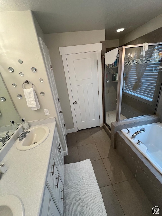 864 E 180 N, Salem, UT 84653 - full bath with a sink, a shower stall, double vanity, a garden tub, and tile patterned flooring