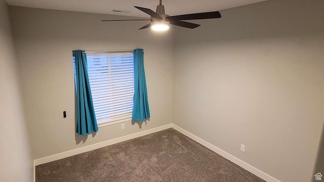 1016 N Vista Loop, Morgan, UT 84050 - unfurnished room featuring dark carpet, baseboards, ceiling fan, and visible vents